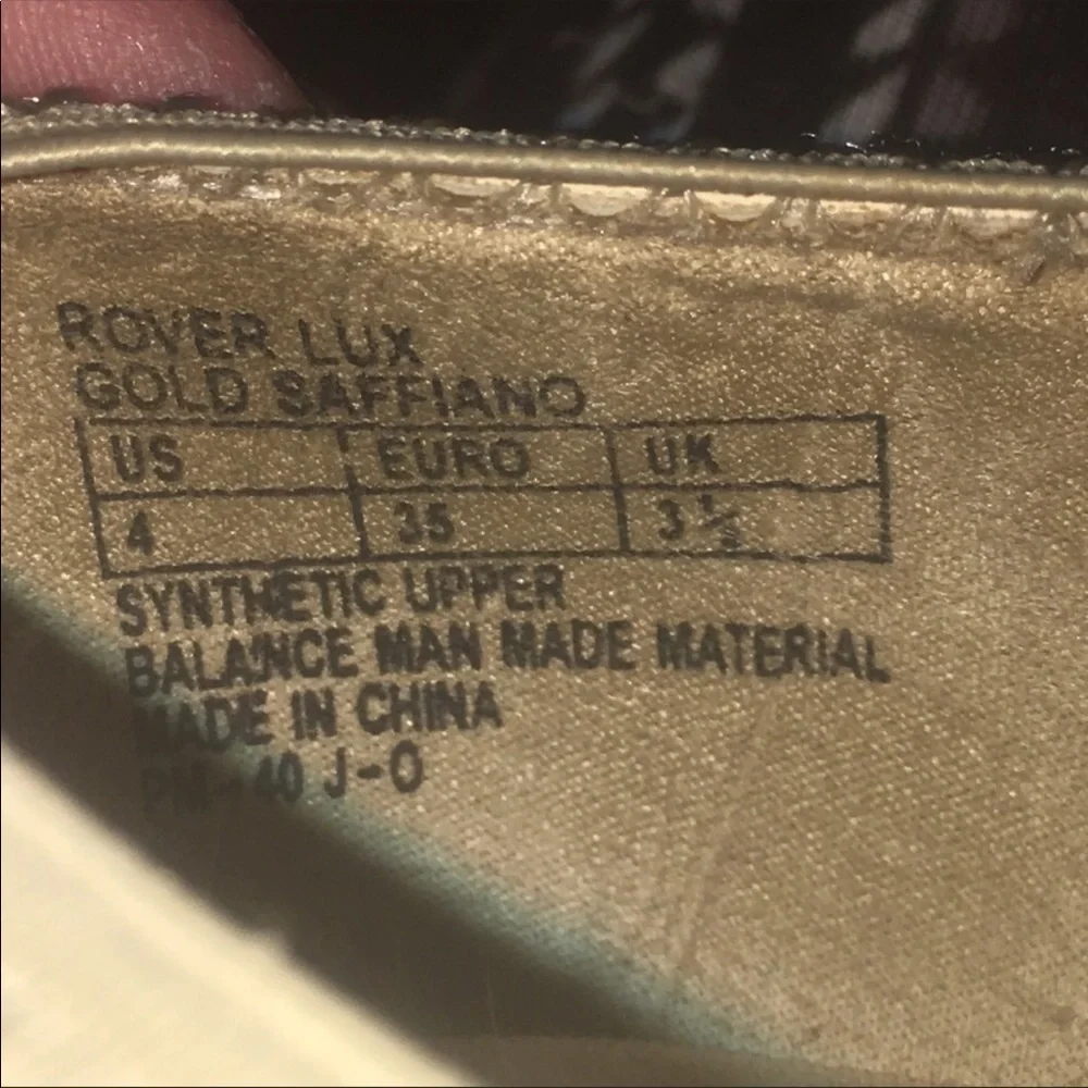 Michael Kors gold “Rover Lux” flats